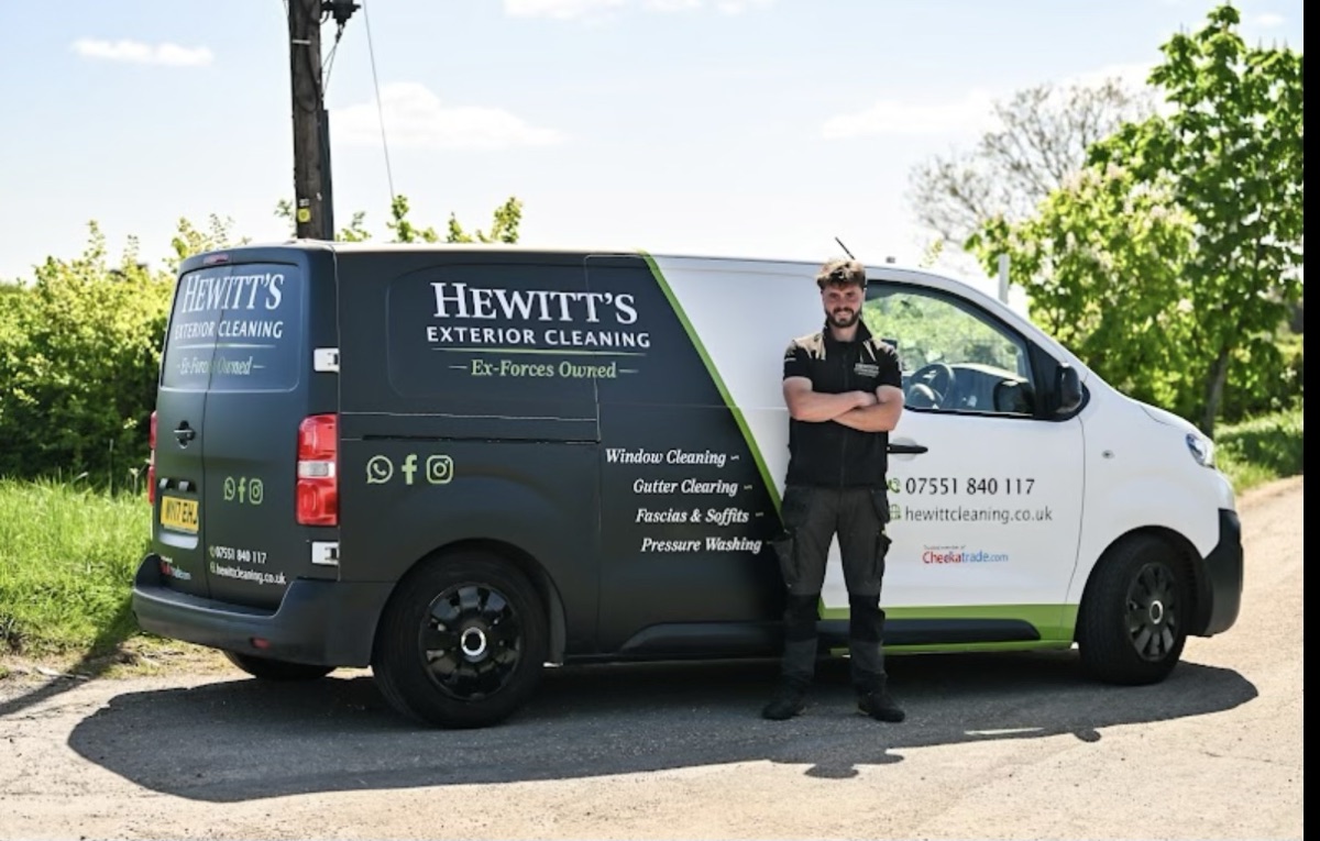 Jordan with his new Hewitt's Exterior Cleaning van